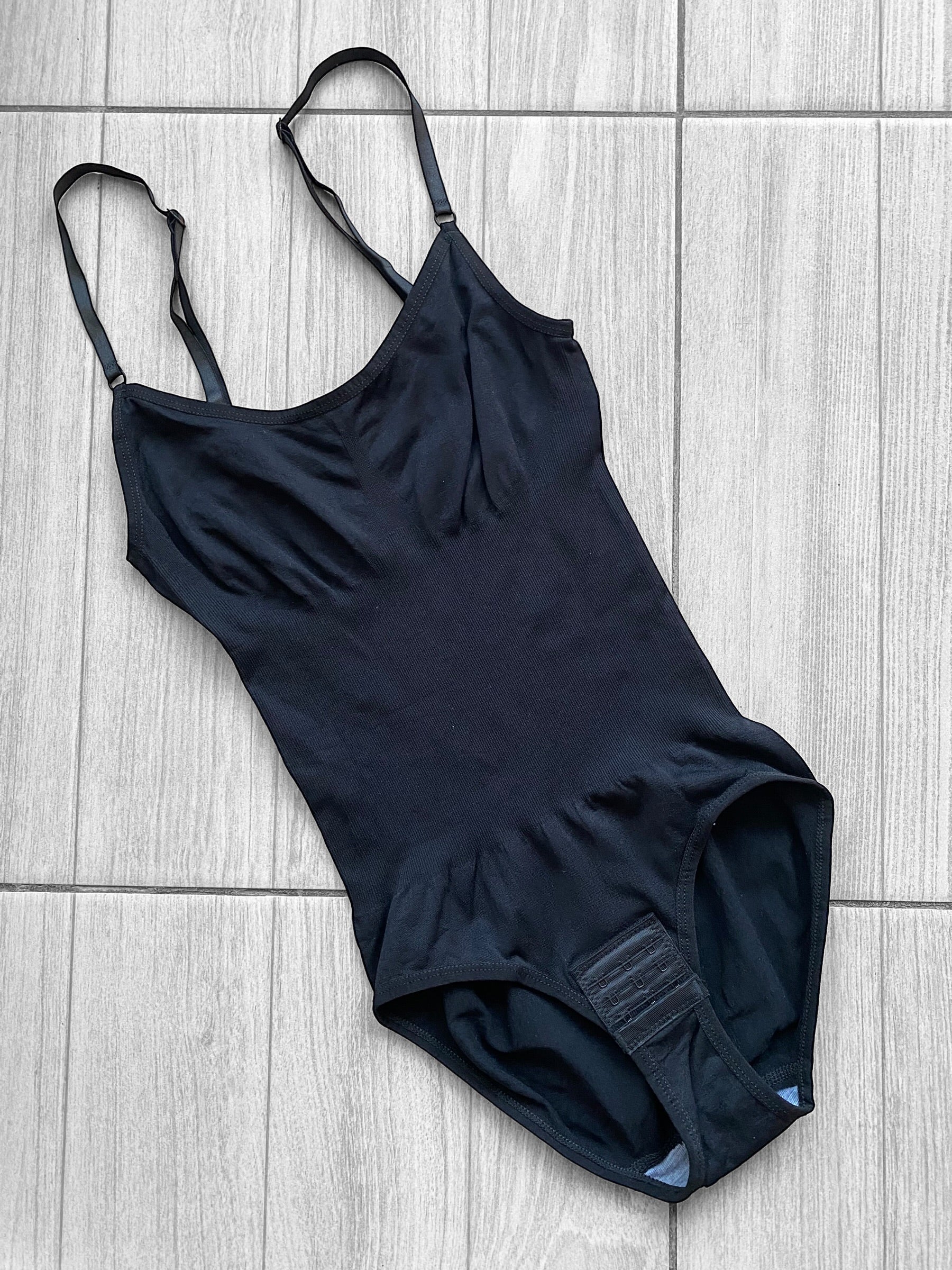 Body reductor con broche