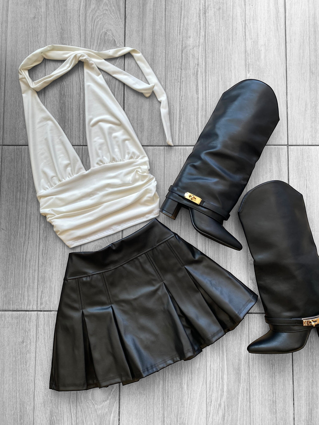 Falda tableada eco cuero con short por dentro