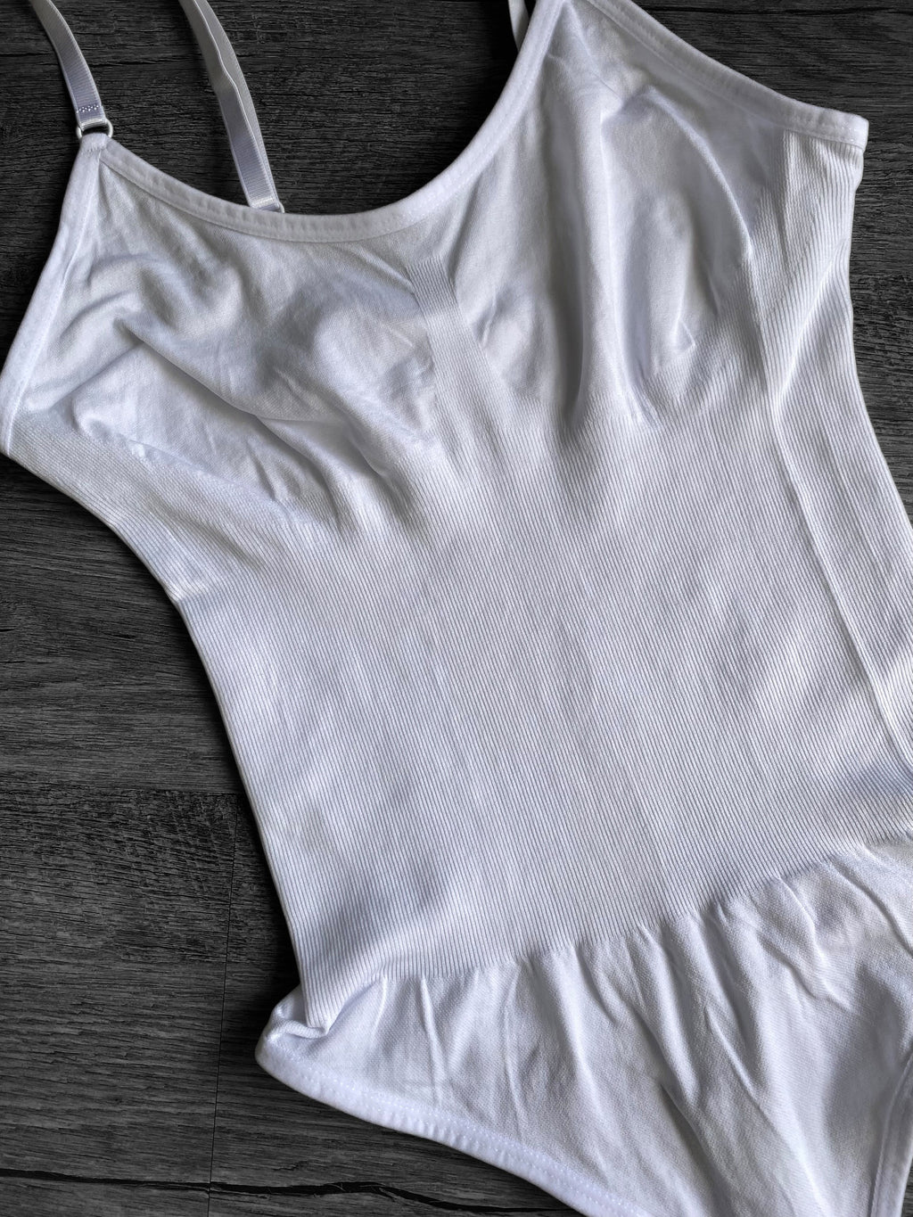 Body reductor con broche
