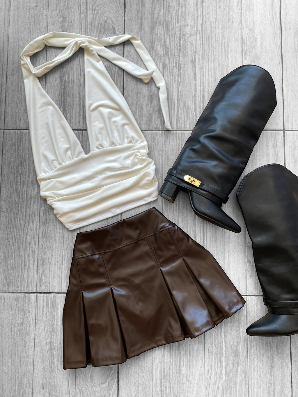 Falda tableada eco cuero con short por dentro