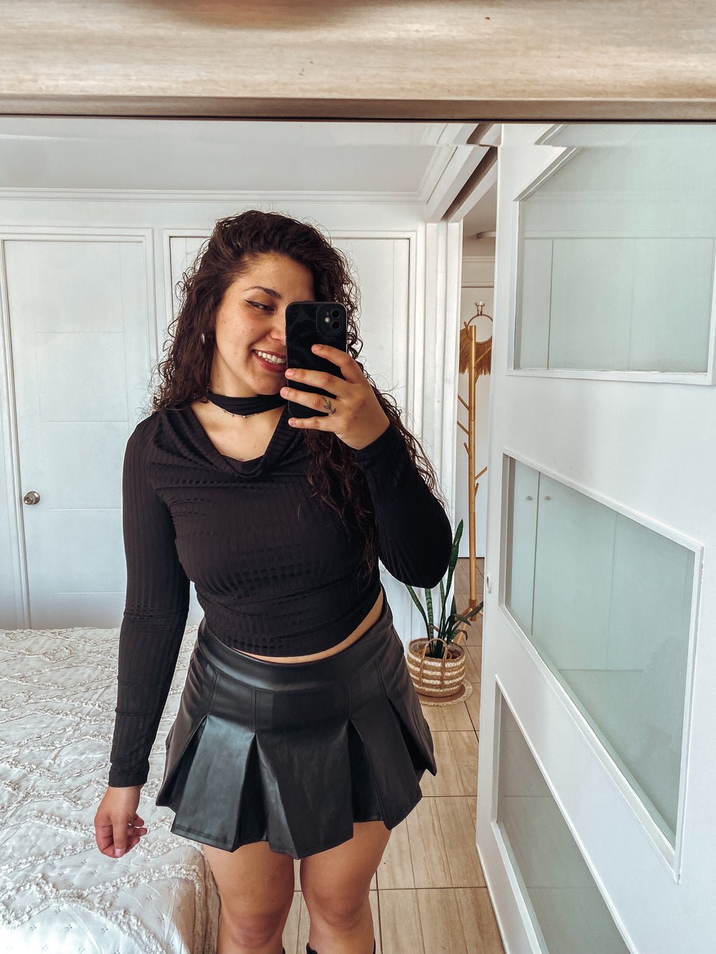 Falda tableada eco cuero con short por dentro