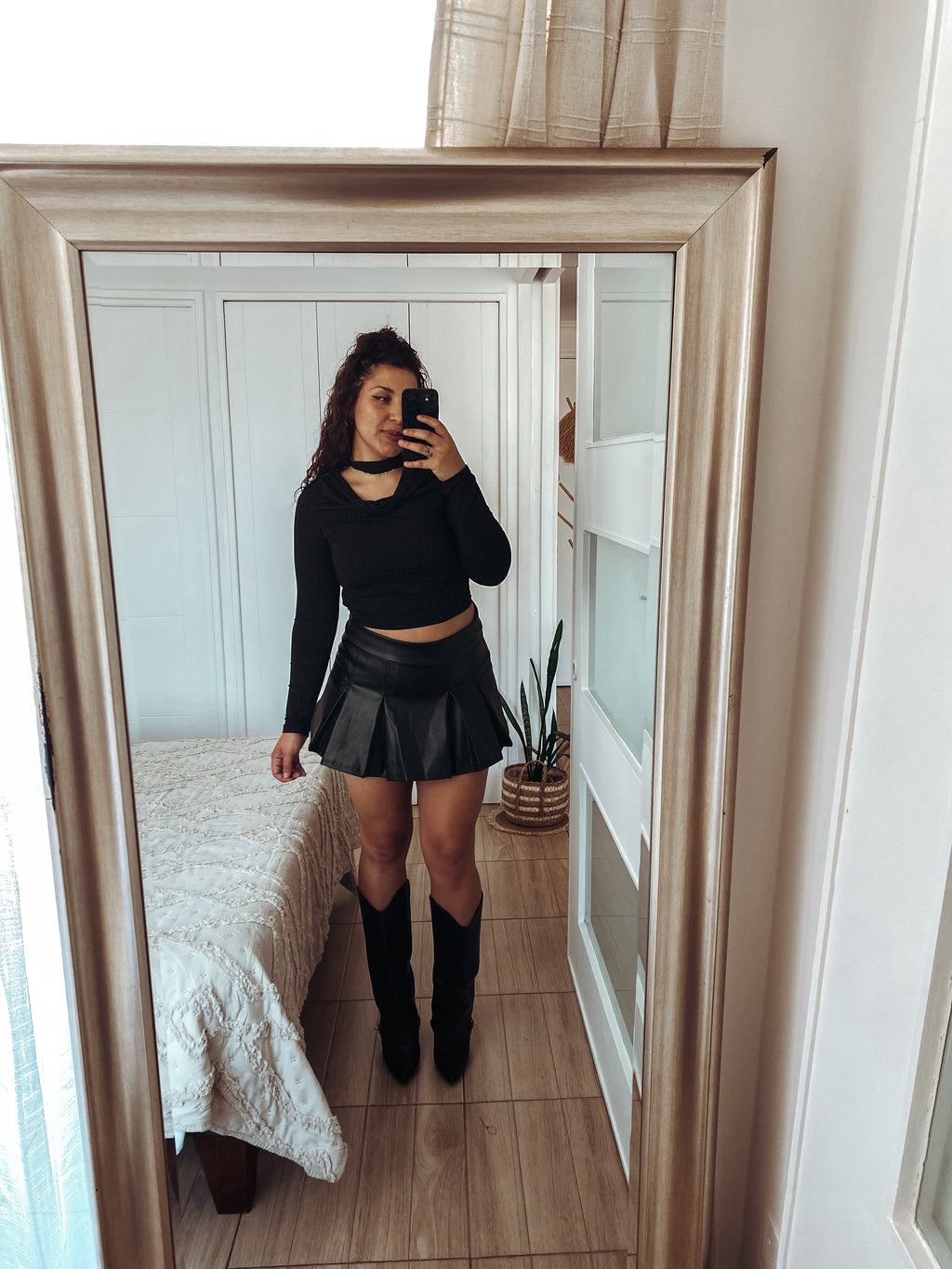 Falda tableada eco cuero con short por dentro